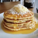 Irresistible Coconut Cream Pancakes Recipe 4 Enjoy fluffy Coconut Cream Pancakes made with coconut milk and shredded coconut for a tropical breakfast treat!